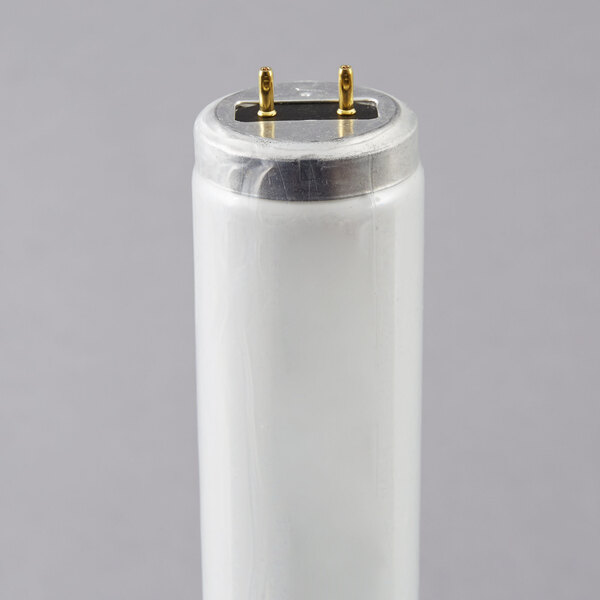 A close up of a white Satco T12 fluorescent light bulb with a silver cap.