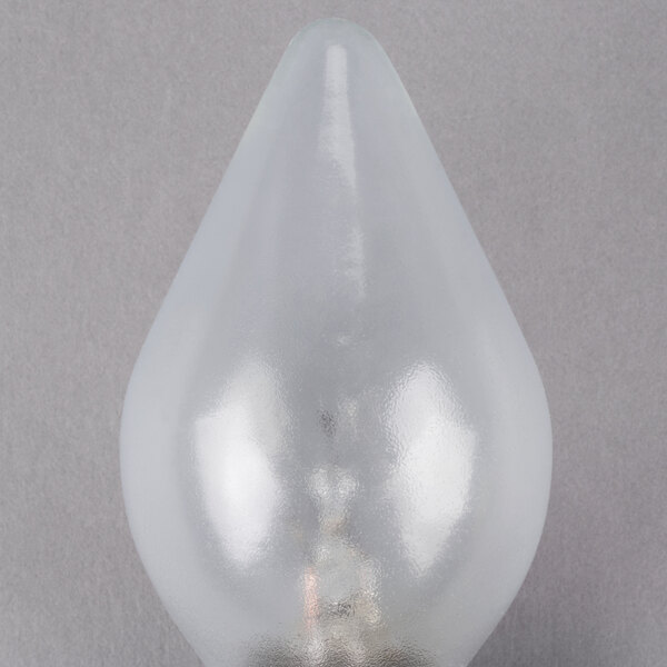 A clear Satco 60 watt light bulb with a silver shatterproof finish and a small hole in it.