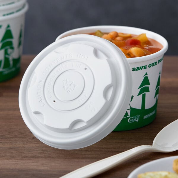 A white compostable plastic vented lid designed for an 8 oz. food cup.