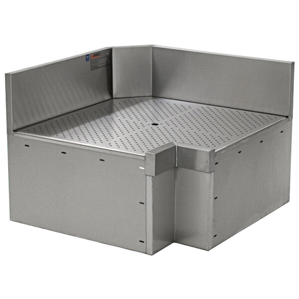 A stainless steel Eagle Group Spec-Bar inner corner workboard with holes over a bar sink.