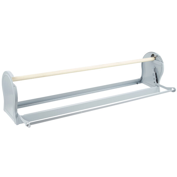 A grey metal Bulman paper dispenser with a straight edge blade.