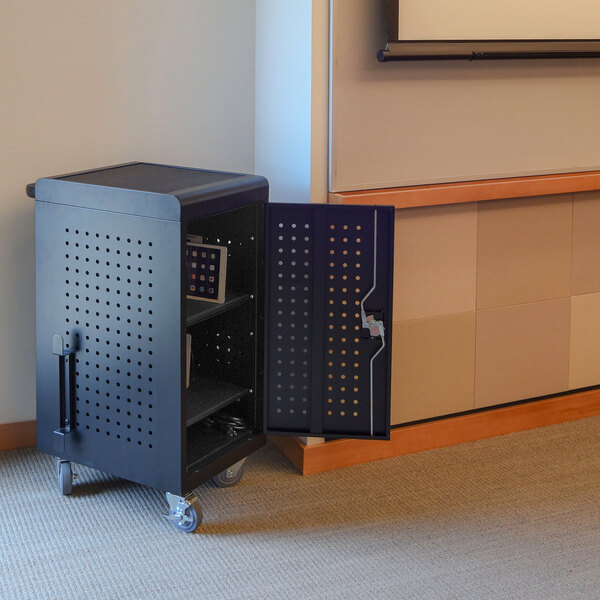 A black metal Luxor tablet charging station with a door open.