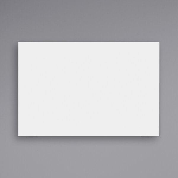 A white rectangular Luxor magnetic glass presentation board with a black border.