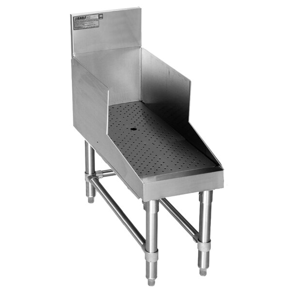 A stainless steel Eagle Group recessed bar drainboard with holes in it.