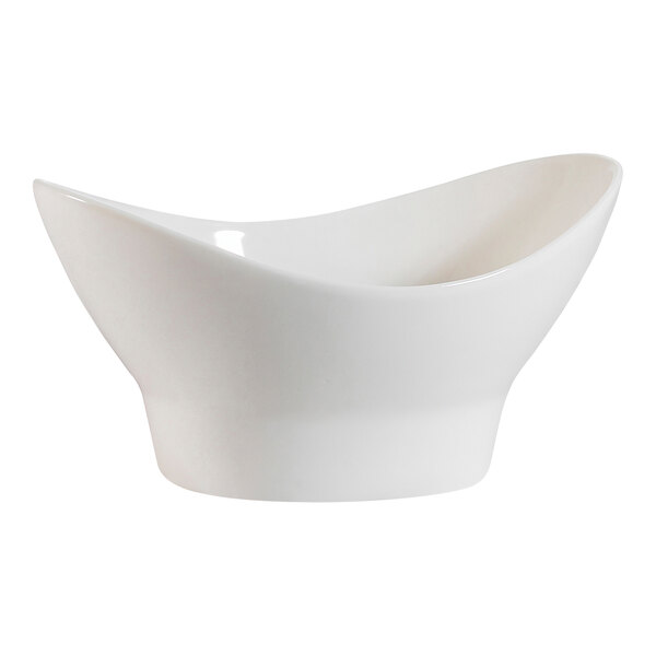 A CAC bone white porcelain bowl with a curved edge.