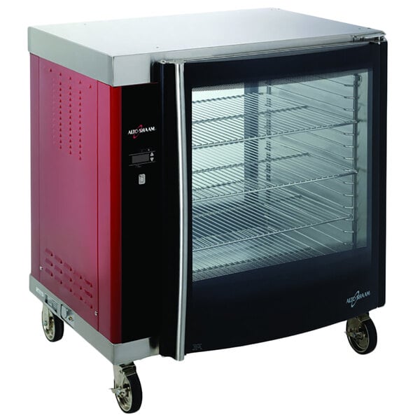 An Alto-Shaam holding cabinet with a glass door and wheels.