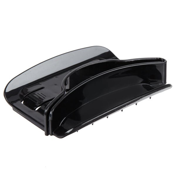 A black plastic hand guard for a mandoline.