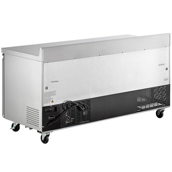 An Avantco stainless steel worktop refrigerator with black and silver rectangular doors.