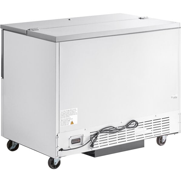 A white Avantco school milk cooler on wheels.