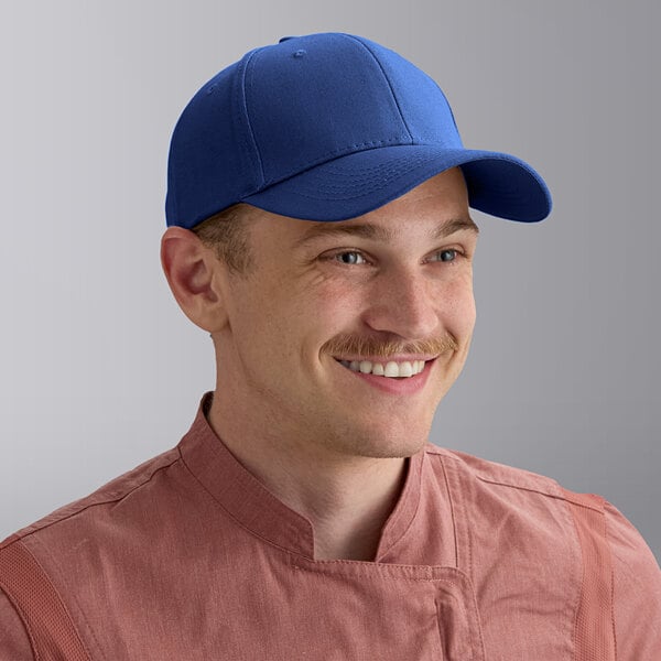 A royal blue 6-panel baseball cap worn by a person.