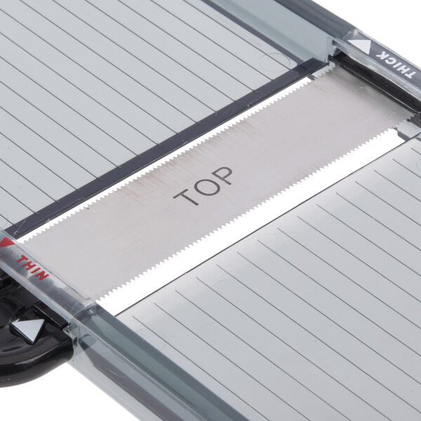 A Mercer Culinary hand slicer blade with a saw-like edge.