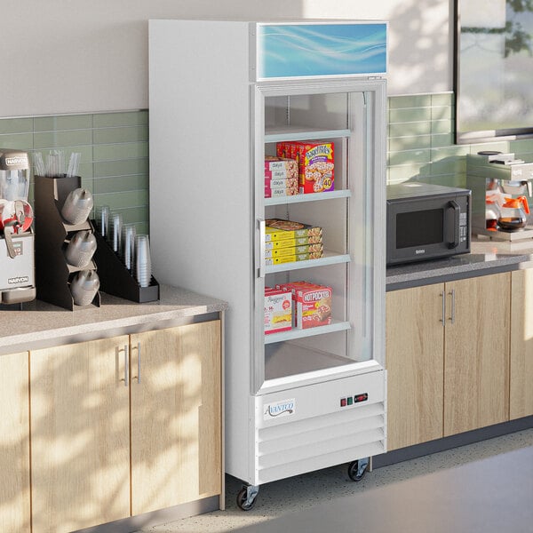 An Avantco glass door merchandiser freezer with LED lighting.