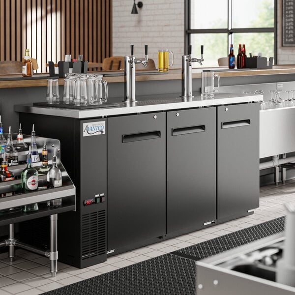 An Avantco UDD-72-HC Double Tap Kegerator on a bar counter.