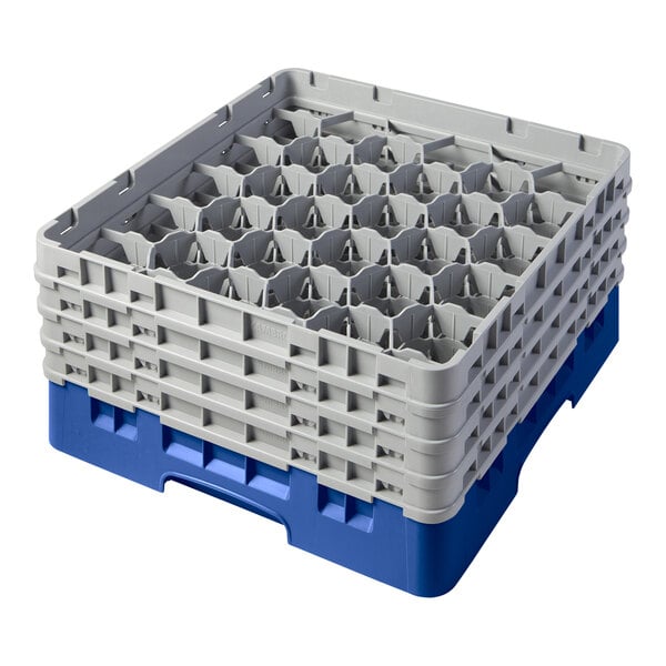 A blue plastic Cambro glass rack with extenders.