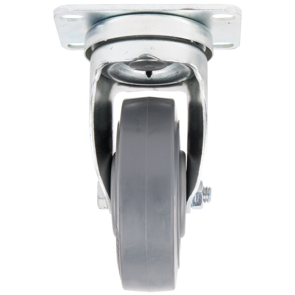 A close-up of a grey wheel with a black rubber base and metal plate.