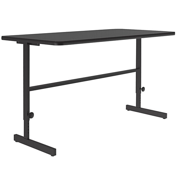 A black rectangular Correll work station table with a black metal frame.