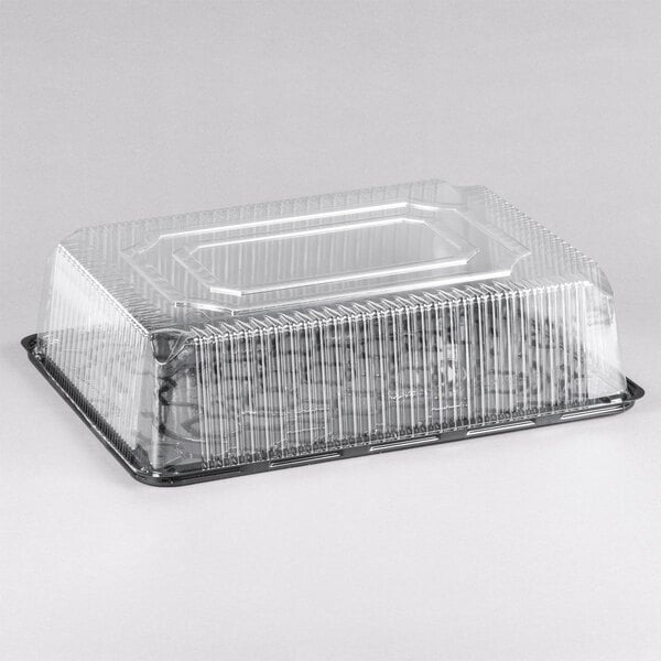 A D&W Fine Pack clear plastic container with a lid.