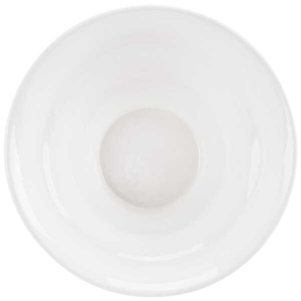 A CAC bone white porcelain bowl with a small hole in the middle.