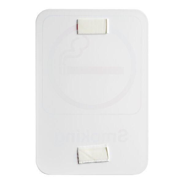 A white rectangular sign with the word "Smoking" in black and a red stripe.