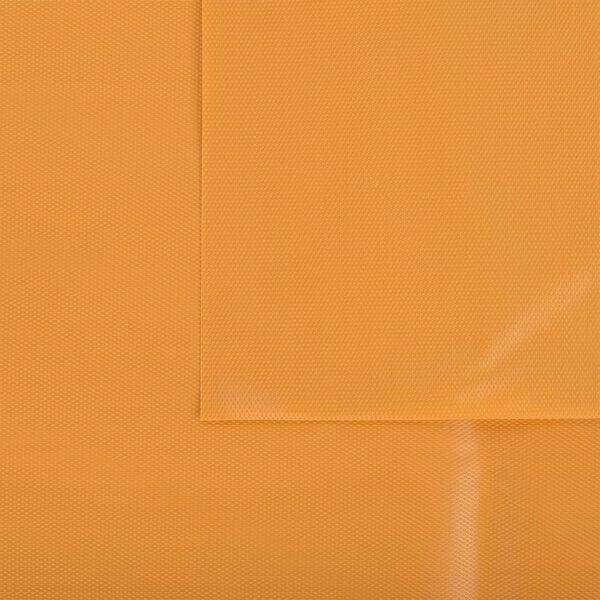 A close up of a yellow plastic table cover with a white pumpkin design.