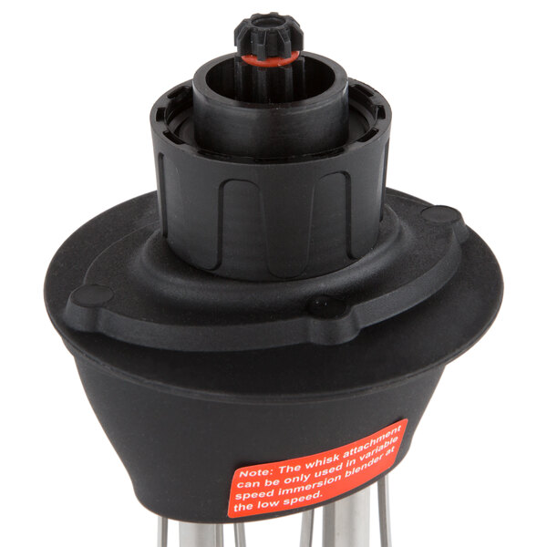 A black plastic whisk attachment with silver and red accents.