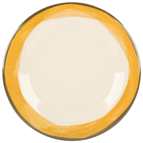 A white melamine plate with a wide ivory rim and a yellow diamond pattern on the edge.