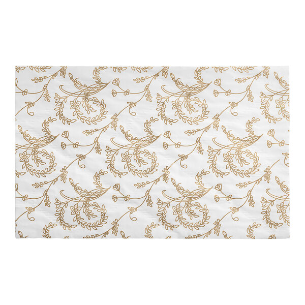 A white Glassine pad with gold floral pattern.