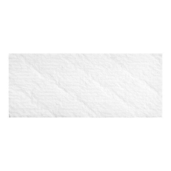 A white rectangular pad of glassine paper with a creased surface.