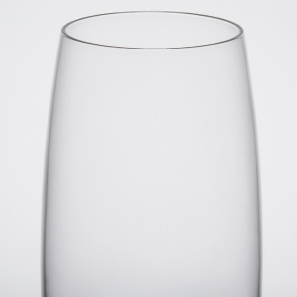 A close up of a clear Libbey highball glass.