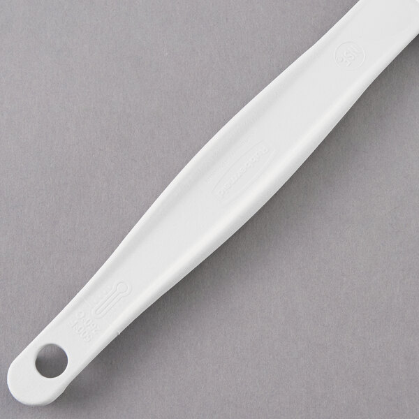 A white Rubbermaid silicone spatula.