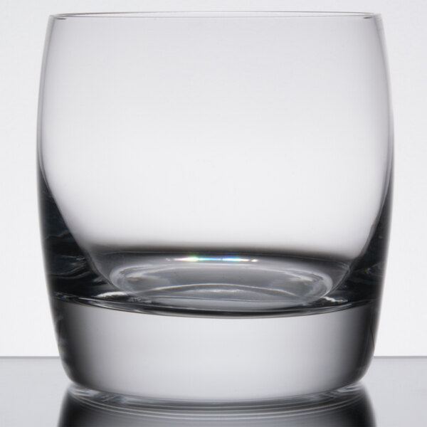 A close up of a clear Reserve by Libbey Symmetry rocks glass.