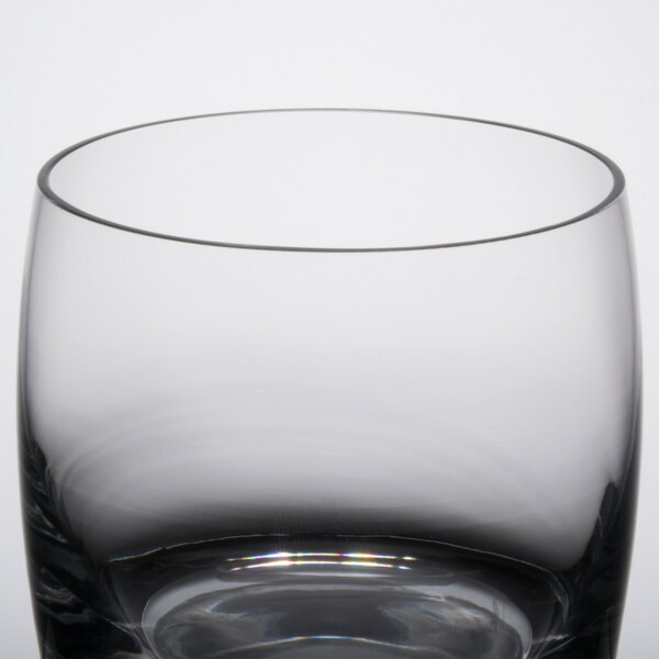 A close up of a clear Reserve by Libbey Symmetry rocks glass.