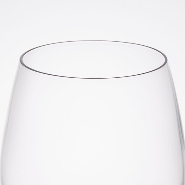 A close up of a clear Reserve by Libbey wine glass.
