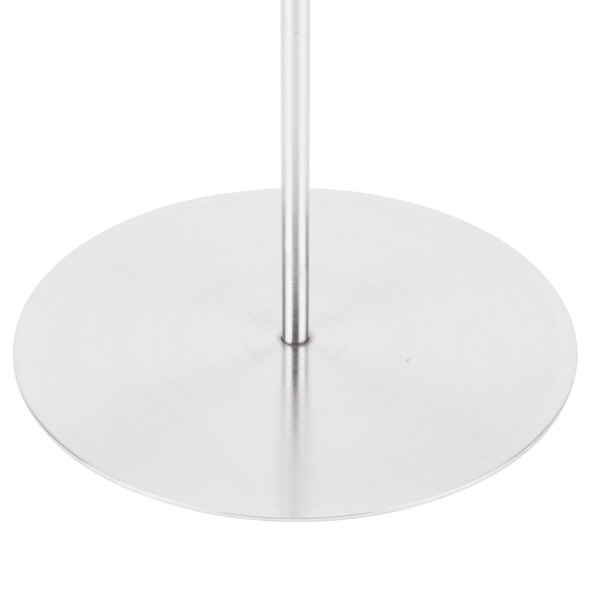 A Clipper Mill stainless steel onion ring tower on a metal pole.