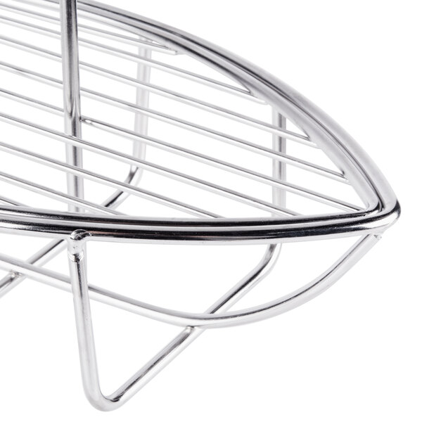 A stainless steel Clipper Mill boat onion ring tower with ramekin holder.