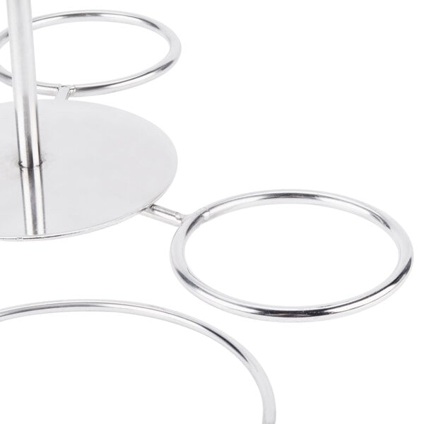 A silver metal Clipper Mill onion ring tower stand with four rings.