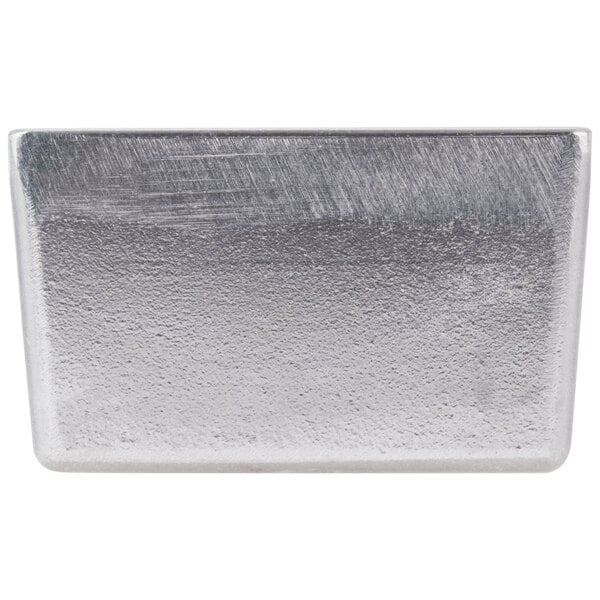 A Tablecraft natural pewter bowl on a metal surface with a white background.