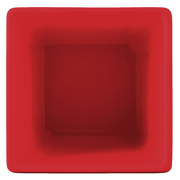 A red square Tablecraft bowl with a white square inside.