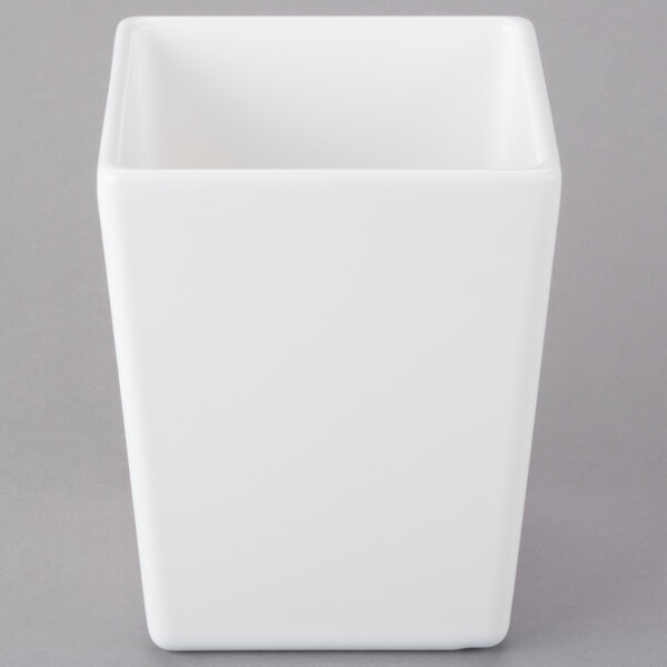A Tablecraft white square container with a white lid.
