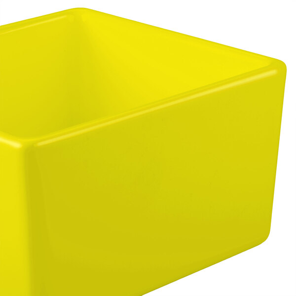 A Tablecraft yellow square straight sided bowl.