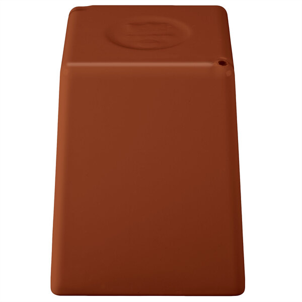 A brown rectangular bowl with a white circle on the bottom.