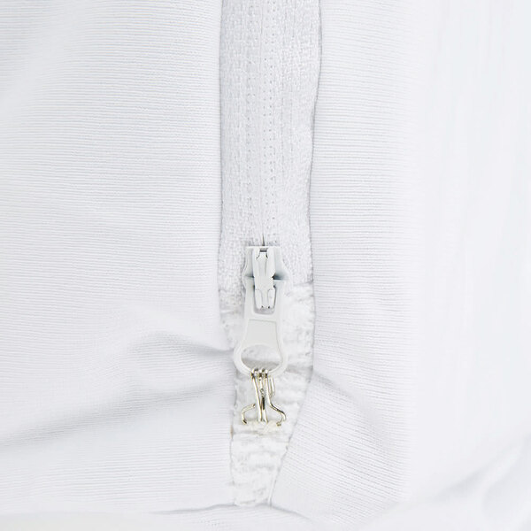 A white fabric with a zipper.