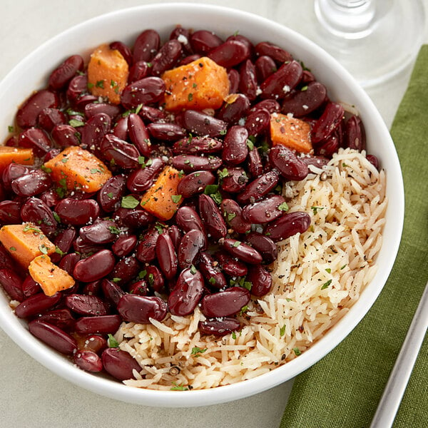 A bowl of dark red kidney beans and rice.