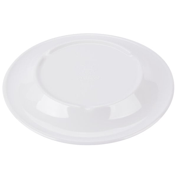A Kanello white melamine plate with a wide rim and a green circle on the edge.
