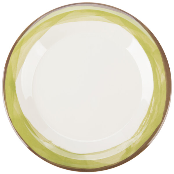 A white melamine plate with a wide rim and a green border.