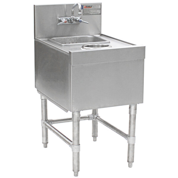 A stainless steel Eagle Group underbar wet waste sink with a splash mount faucet.