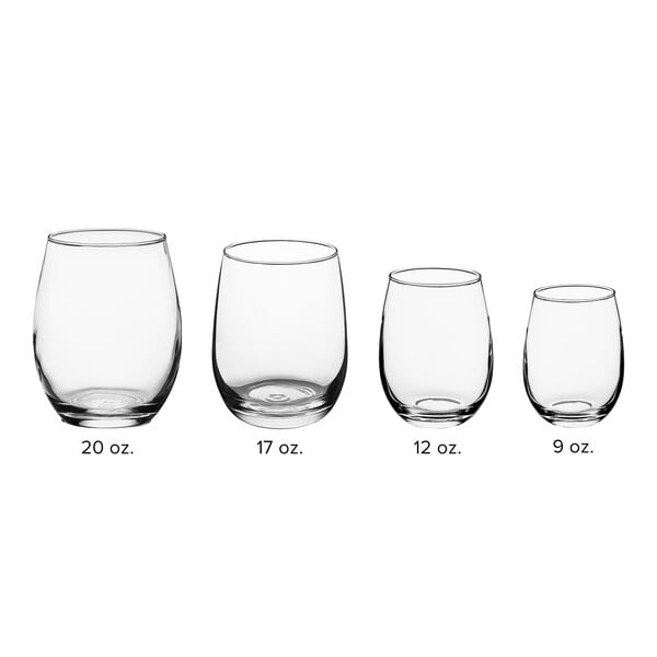 A row of clear Acopa stemless wine glasses.