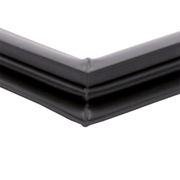 A close-up of a black square corner of a True 810714 equivalent magnetic door gasket.
