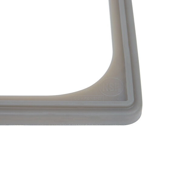 A gray silicone square with a logo.