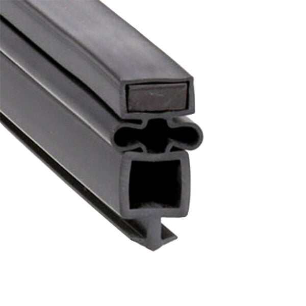 A close-up of a black rubber seal with two holes in a black square.